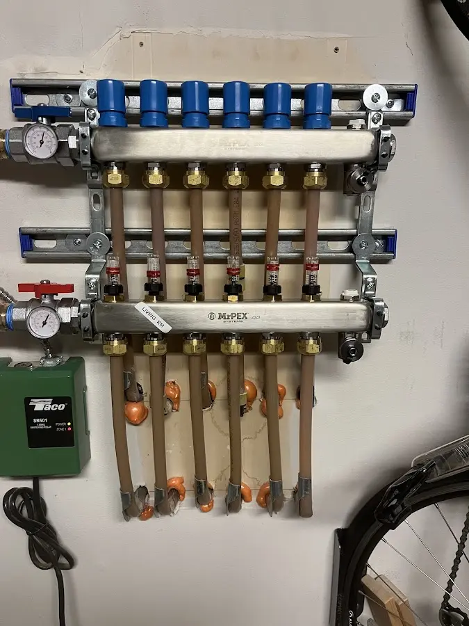 Plumber performing Water Heater Repair at a residential property in Tucson